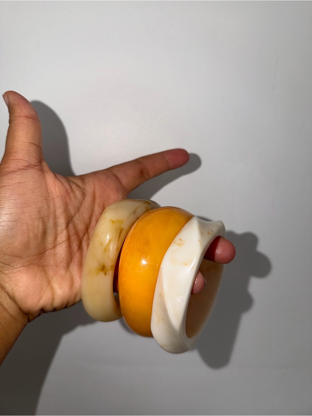 Set of Three Resin Bangle Bracelets in Cream and Amber Yellow